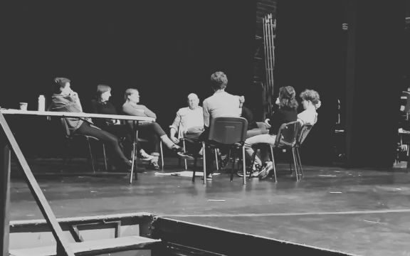 People on stage during workshop